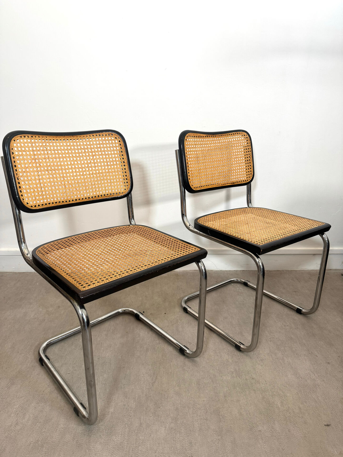 Pair of Marcel Breuer B32 Cesca chairs made in Italy.