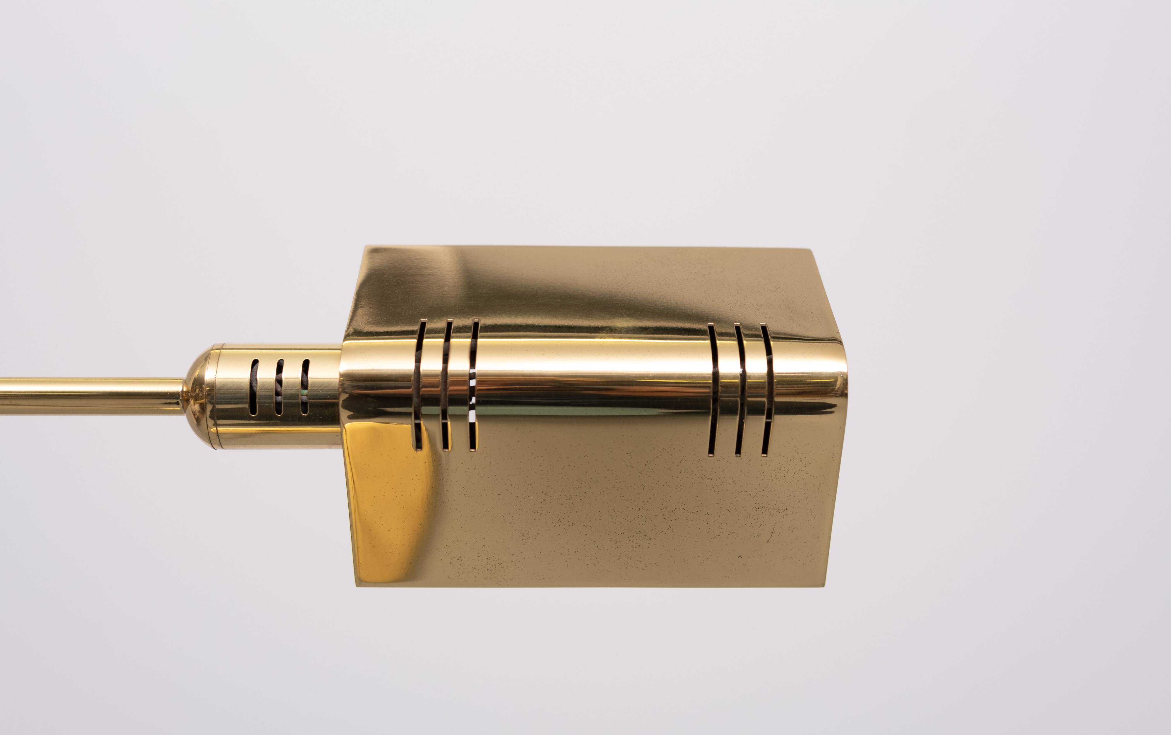 Holtkoetter adjustable Brass swing arm floor lamp. Germany