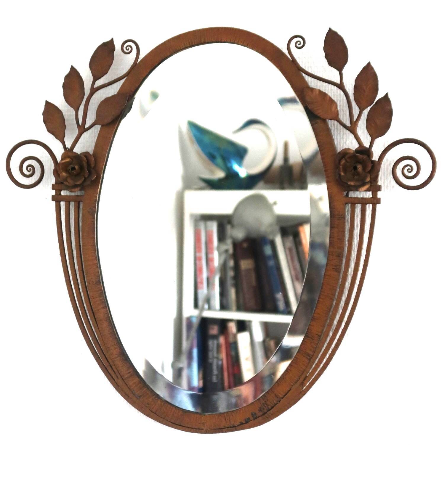 Art Deco mirror from the 1930s in hammered steel.
