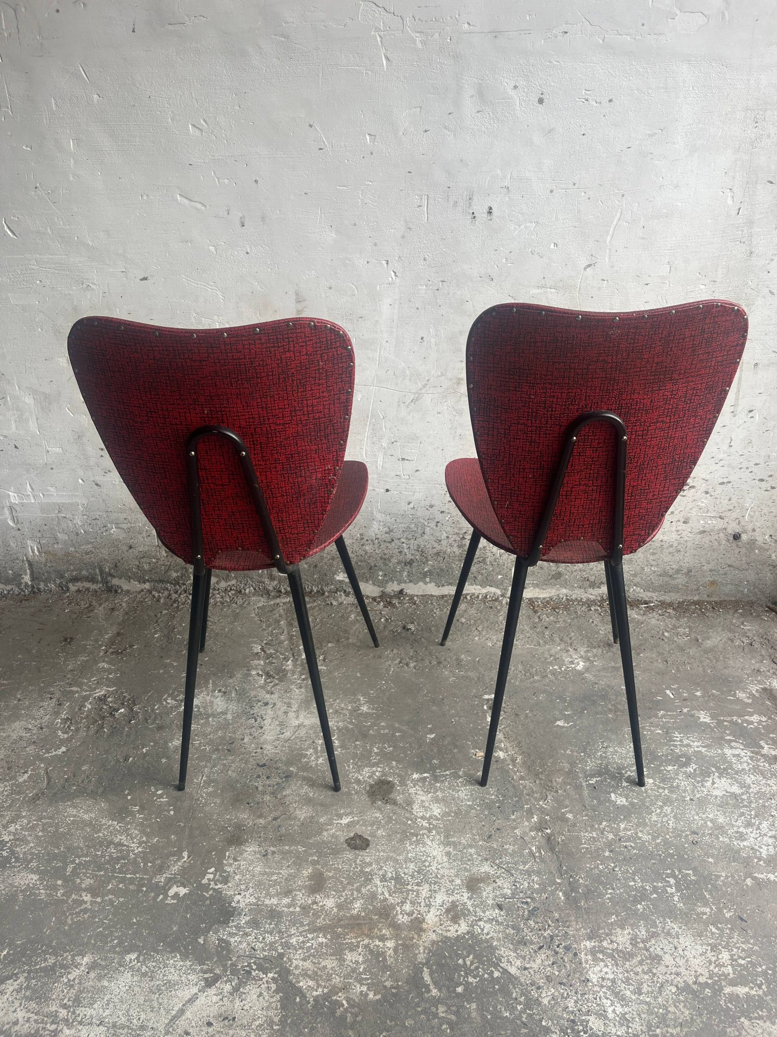 Pair of Mid-Century Red Vinyl Dining Chairs with Black Metal Legs, Sculptural Curved Backs
