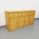 Vintage storage unit in rattan and woven rattan from the 1970s.