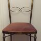 Chaise en métal doré