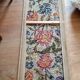 1970s wall tapestry with large multicoloured flowers