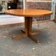 Extendable round table in teak from the 60s with two extensions