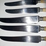 29-piece horn cutlery set, knives and serving utensils.