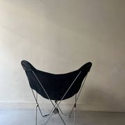 fauteuil design papillon en chrome et cuir noir