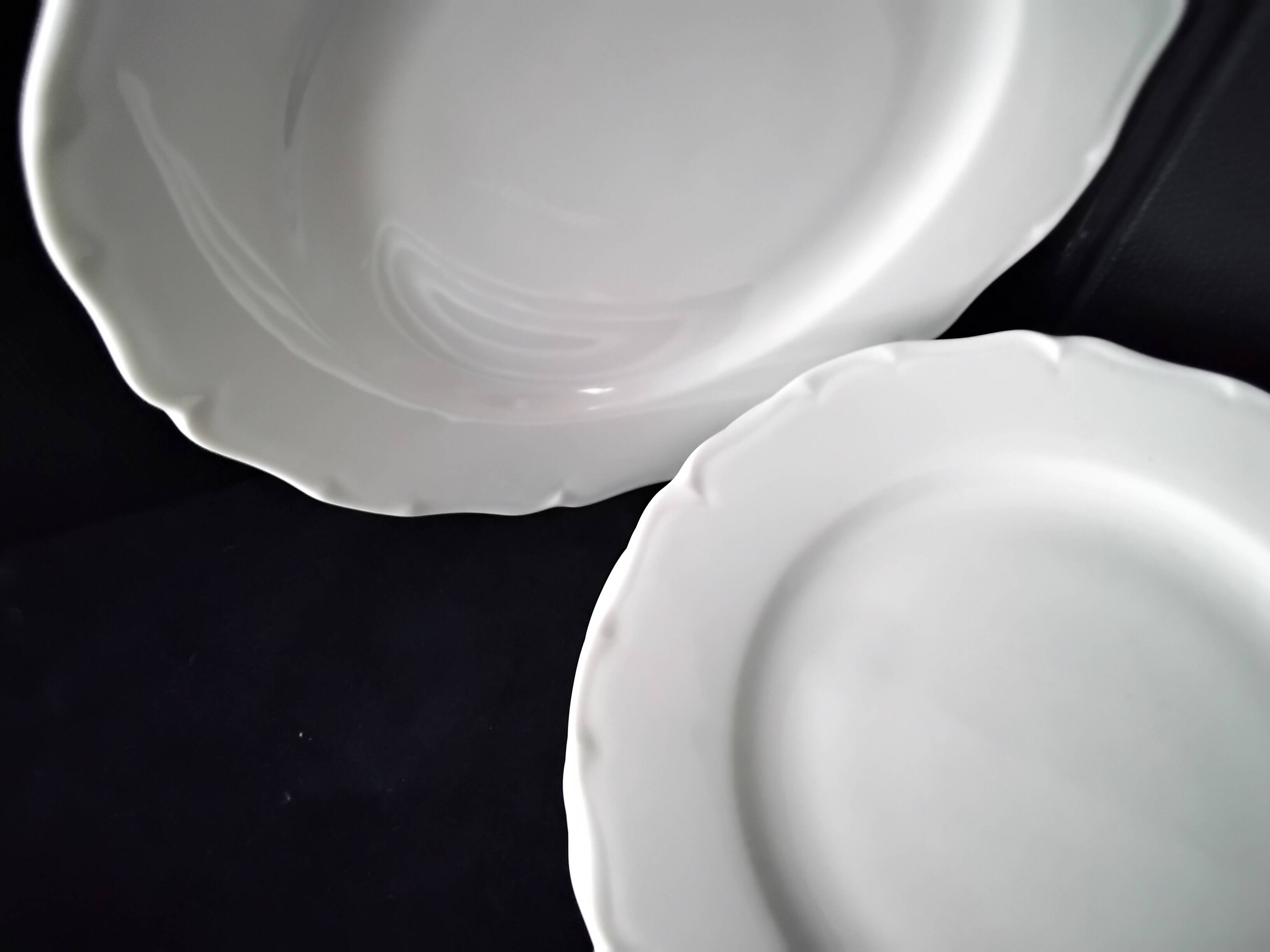 4 white Limoges porcelain dessert plates