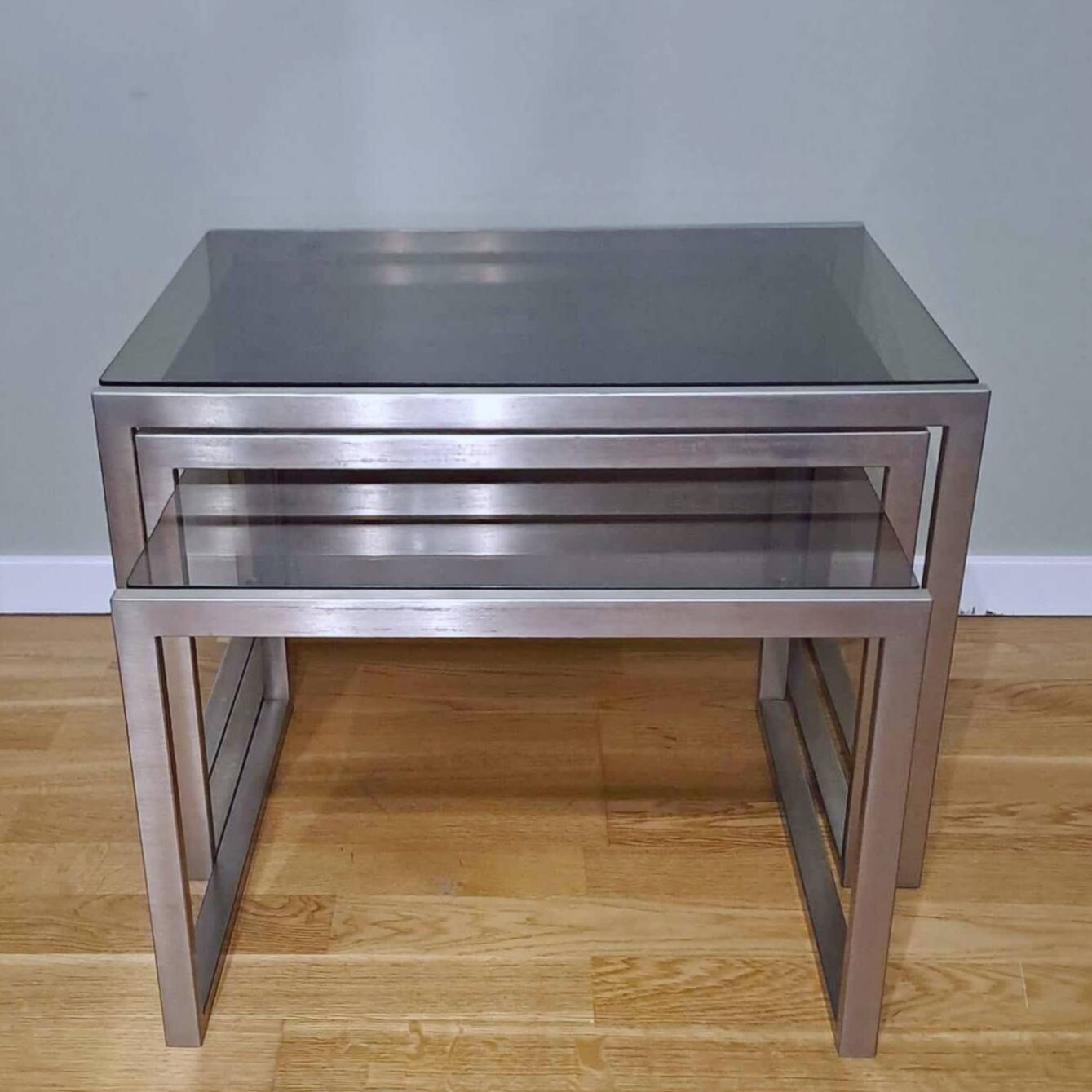 Chrome and smoked glass designer nesting table