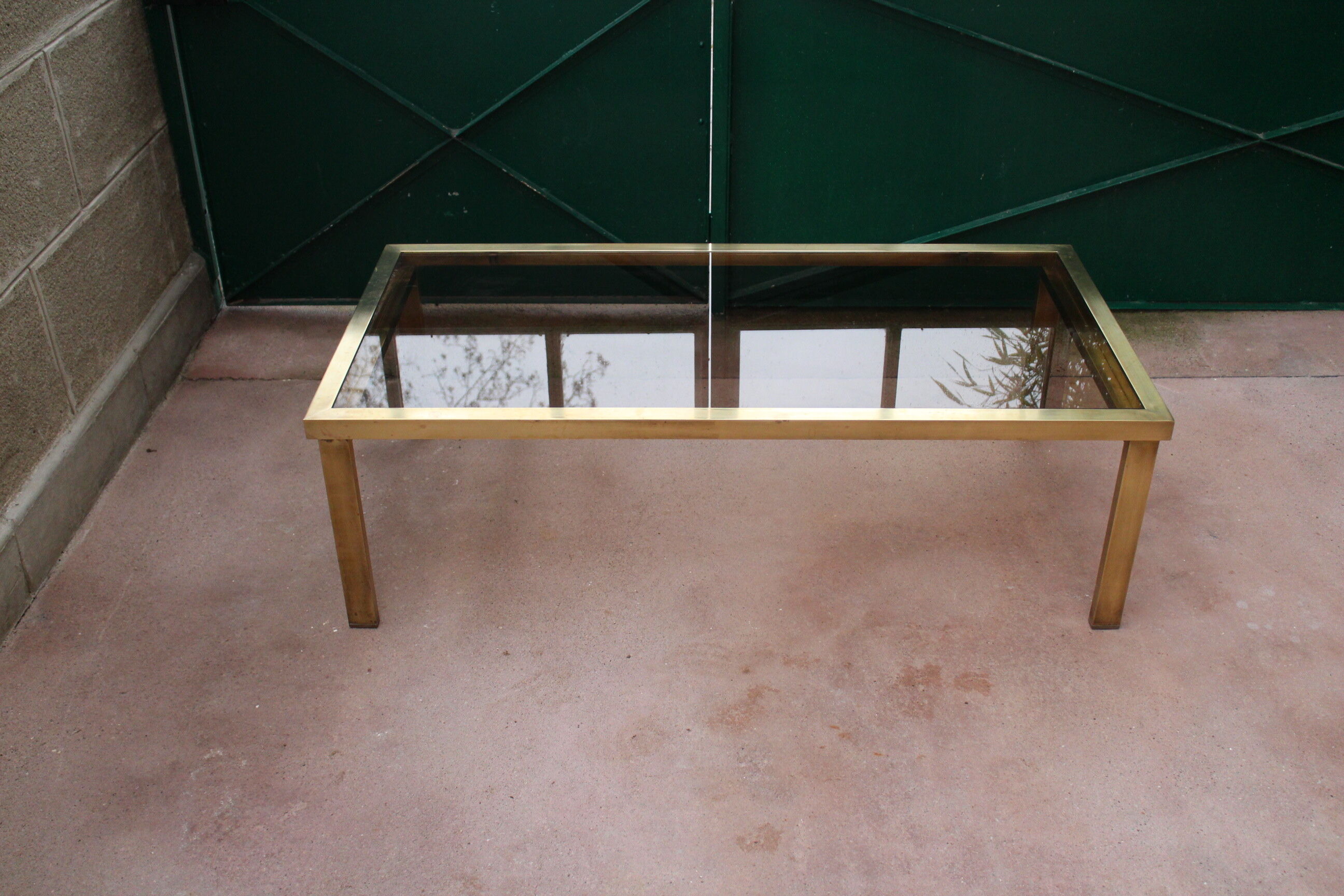 Brass coffee table and 1970 smoked glass