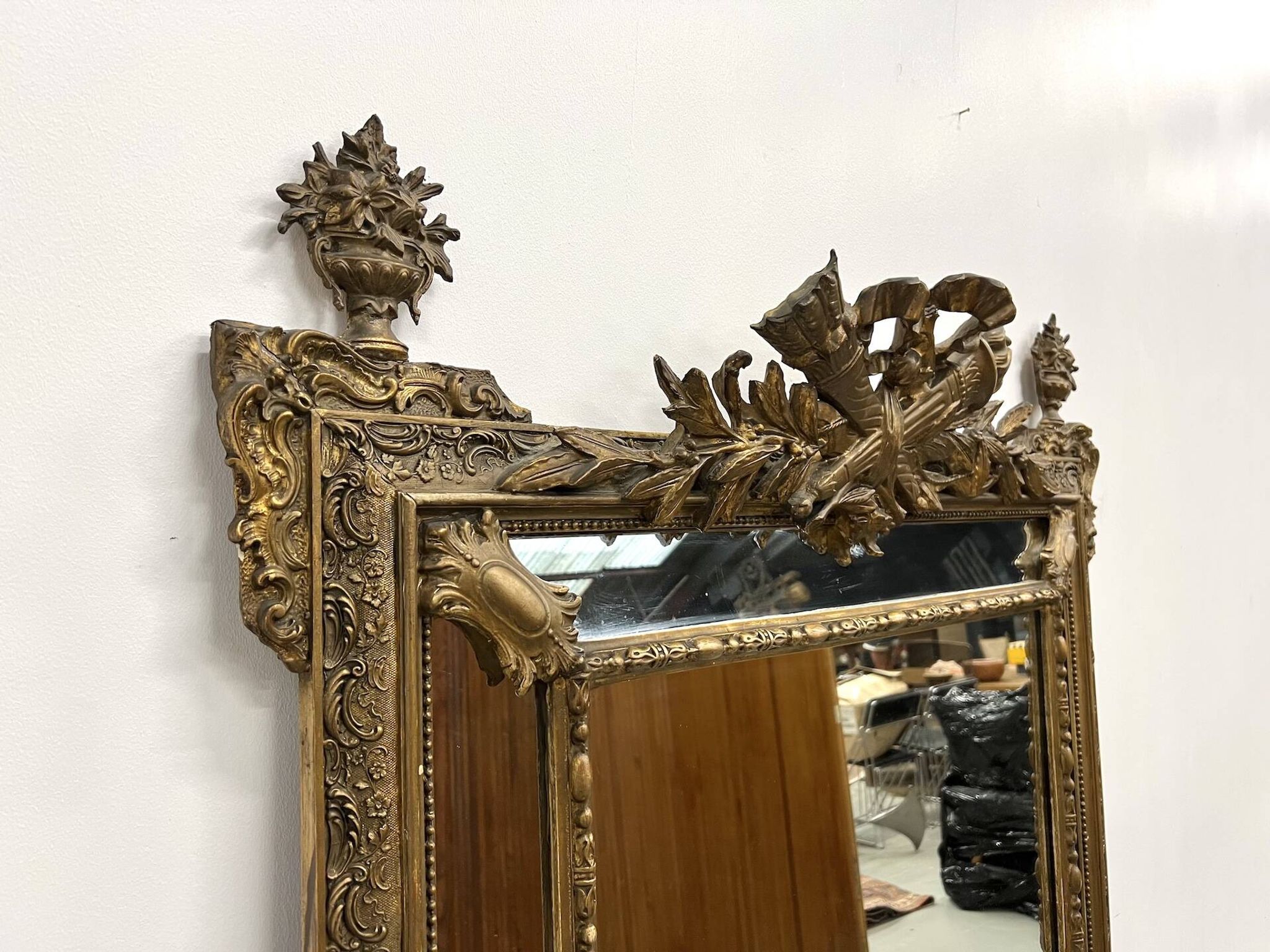 Large antique pediment mirror with mouldings.