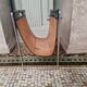 Vintage Brabantia magazine rack in black leather