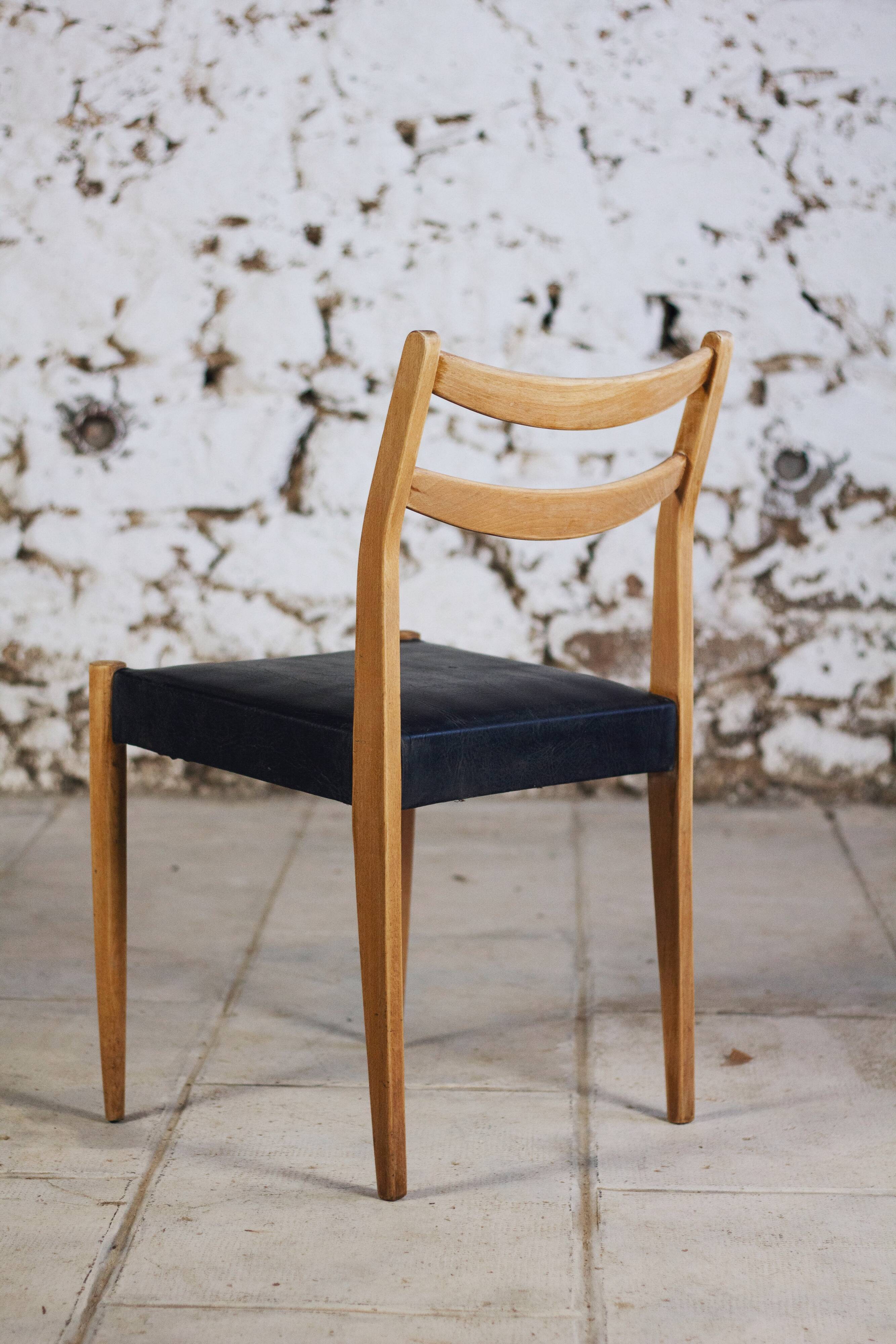 Scandinavian chair in teak and faux leather, 1960.