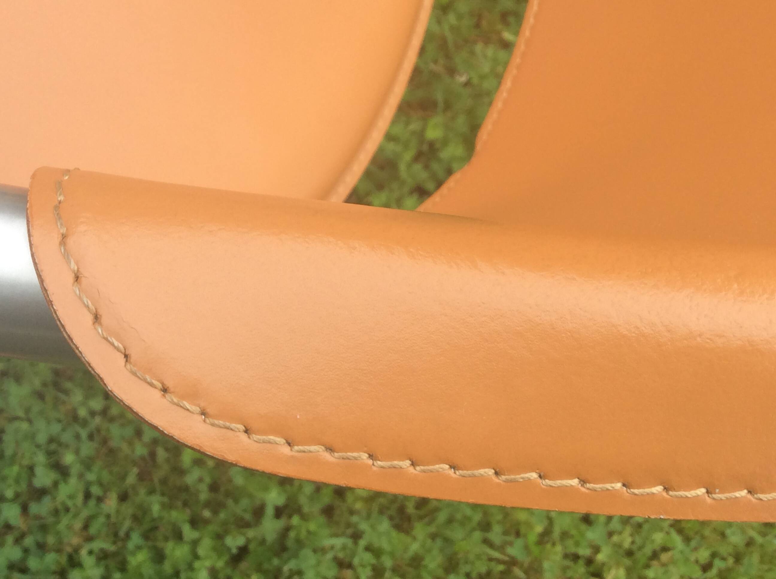 Leather and metal armchairs