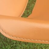 Leather and metal armchairs