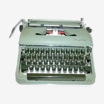 Machine à écrire de Marque Olympia modèle Oriette de luxe SG-3  vintage 1960