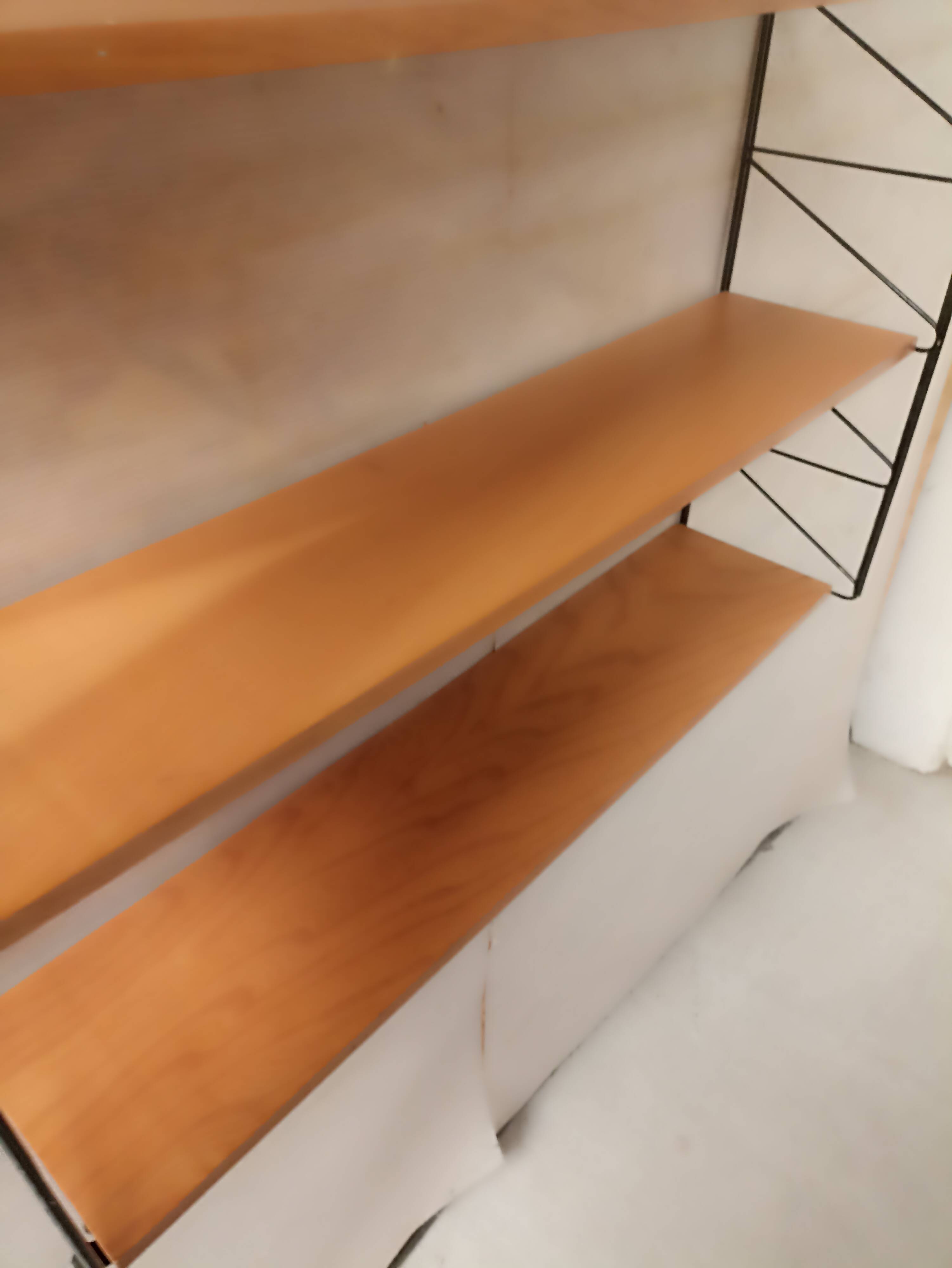 String style wall shelf