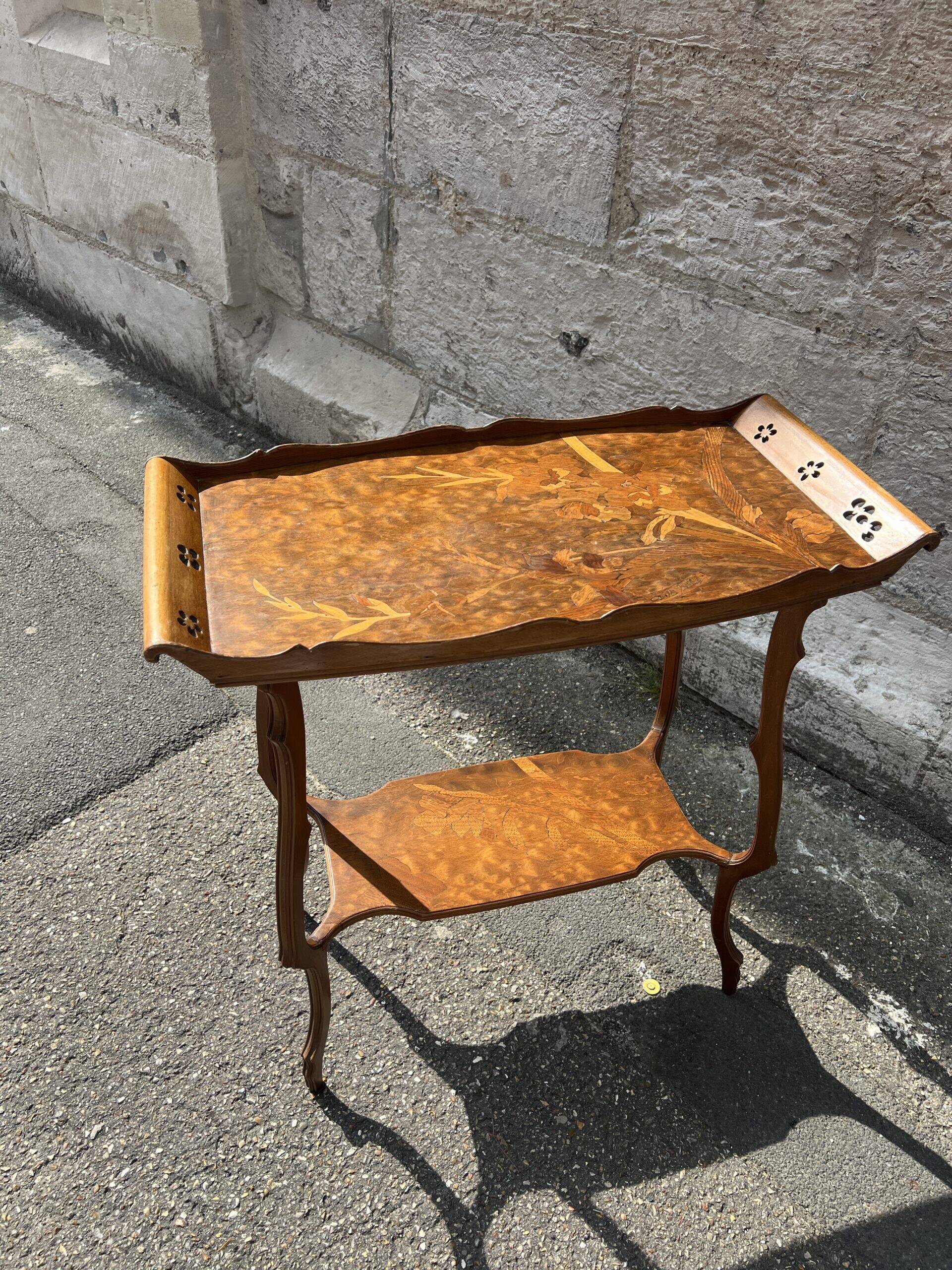 Art Nouveau period two-tiered tea table in veneered wood, signed Émile Gallé