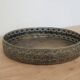 Round metal plate in patinated gold with an openwork border – D30 cm