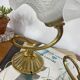 Pair of antique wall sconces with swan neck in brass, glass tulip.