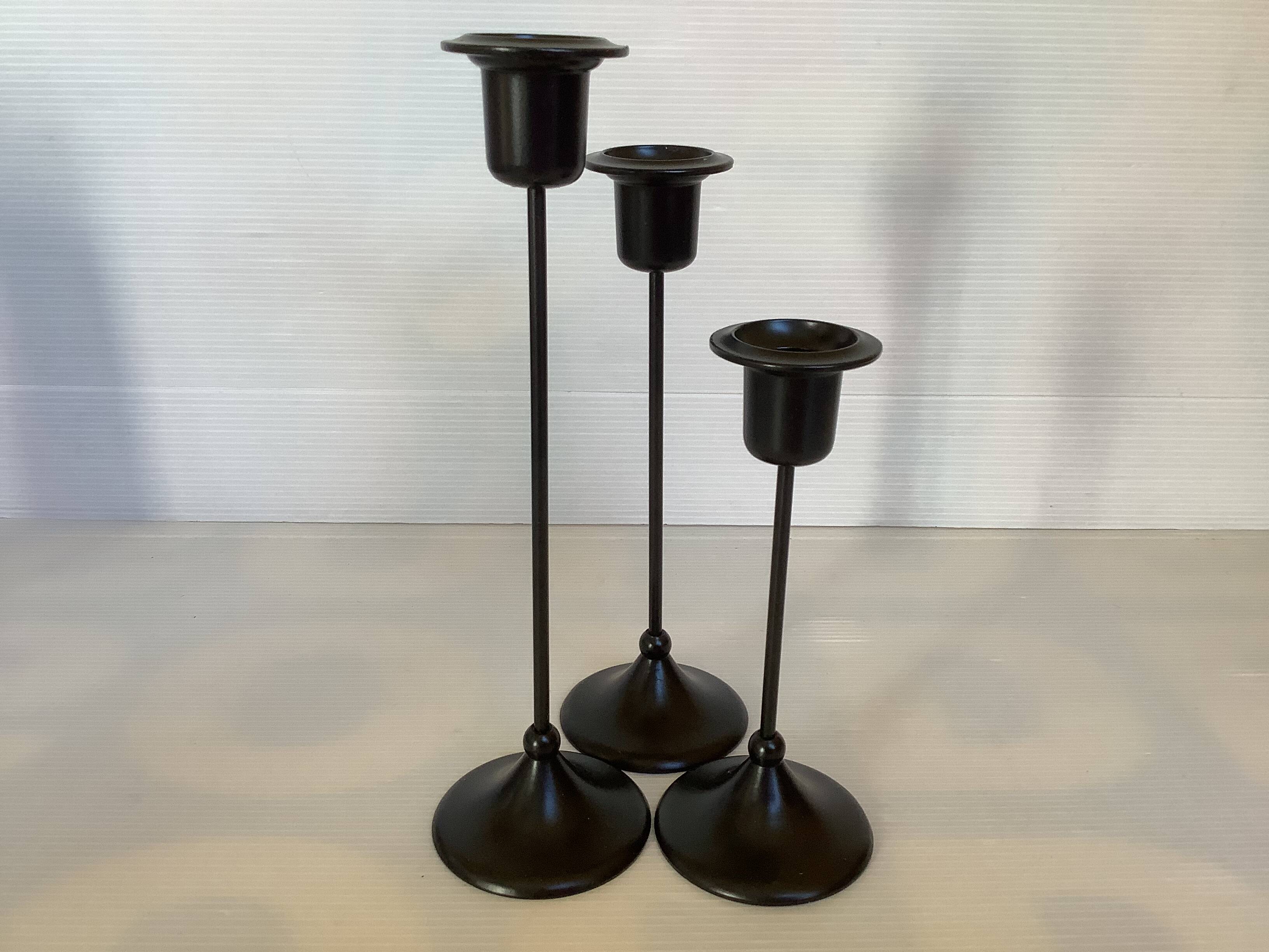 Trio of Scandinavian candlesticks with black tulip base