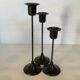 Trio of Scandinavian candlesticks with black tulip base