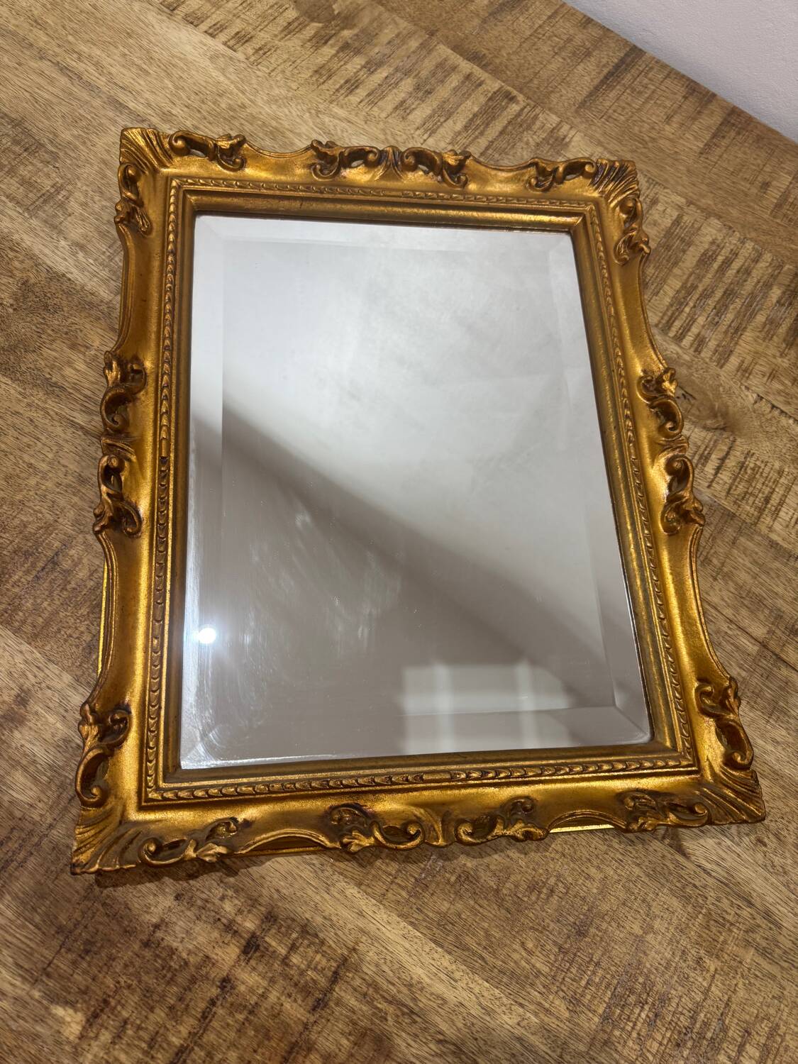 Beveled gold mirror