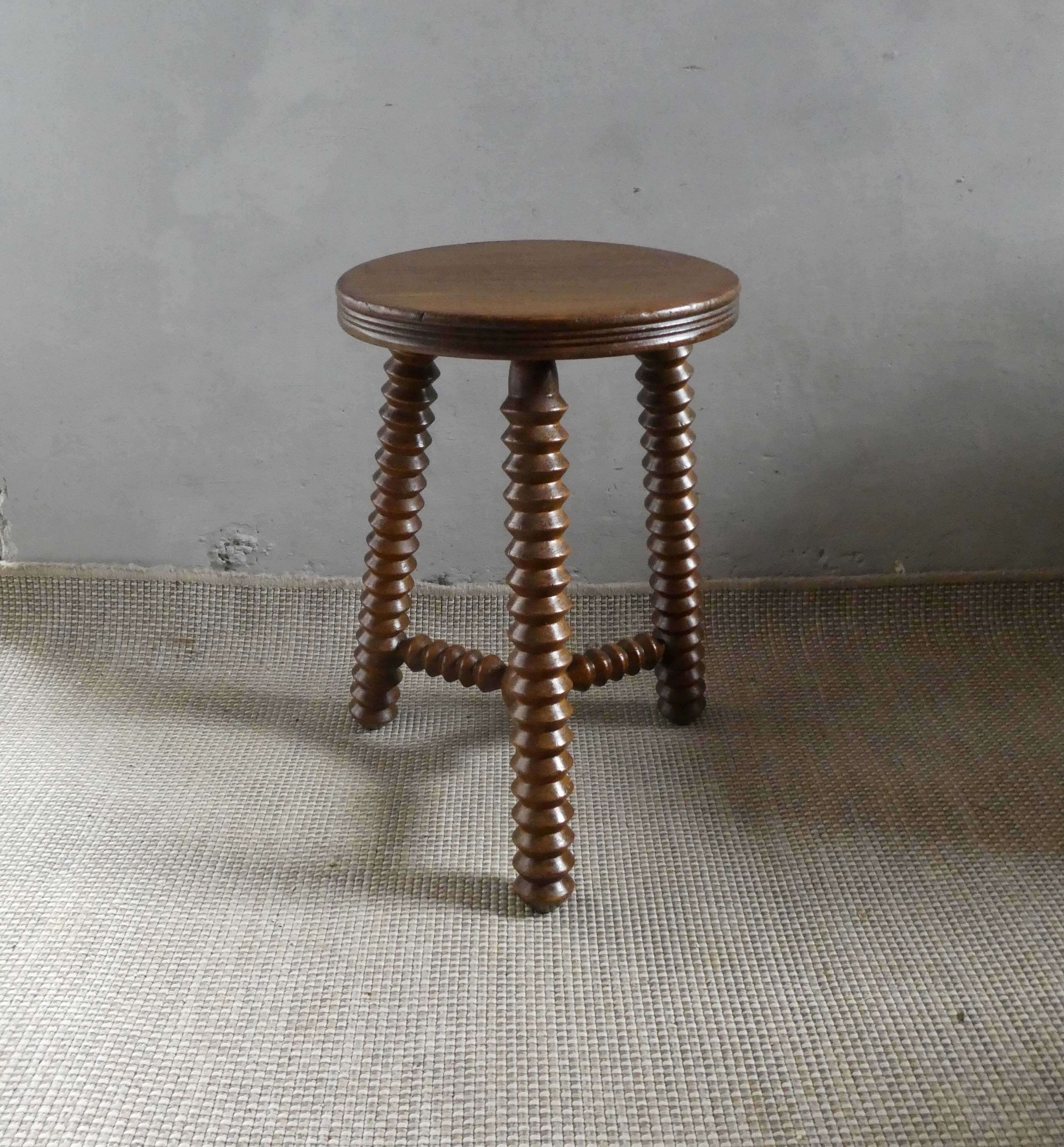Tripod stool, with carved legs, around 1940