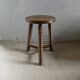 Tripod stool, with carved legs, around 1940
