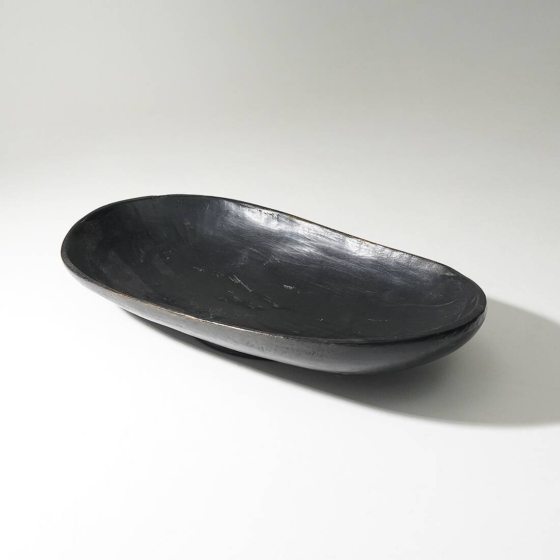 Organic shaped black wooden bowl, 1960s