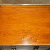 Victorian high chest of drawers in walnut with a bronze gallery.