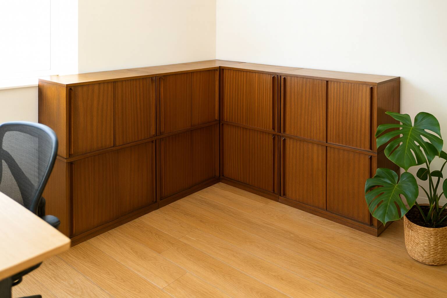 Modular corner library Oscar from the 1960s with sliding doors.