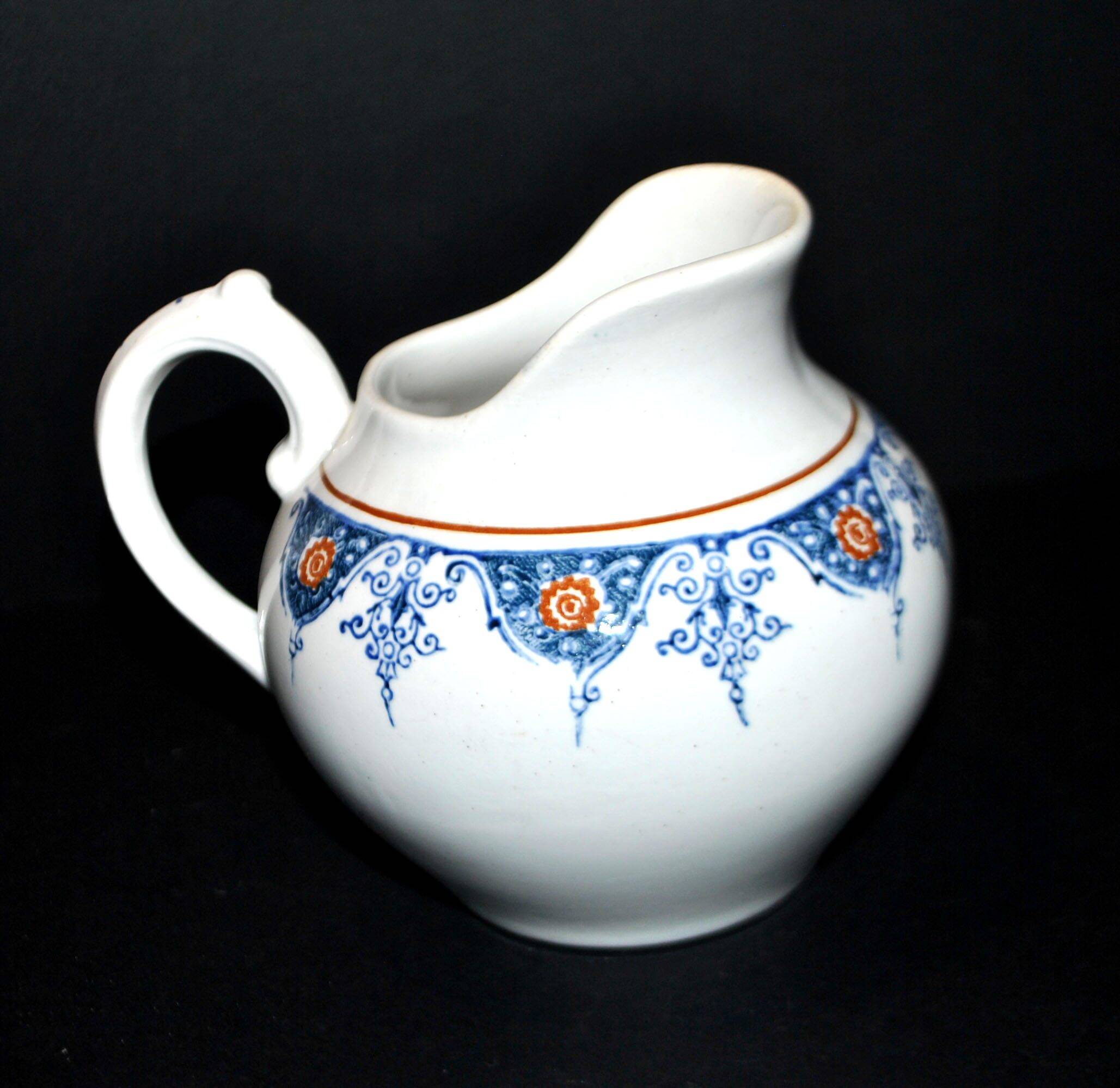 Saint Amand earthenware pitcher with stencil decoration