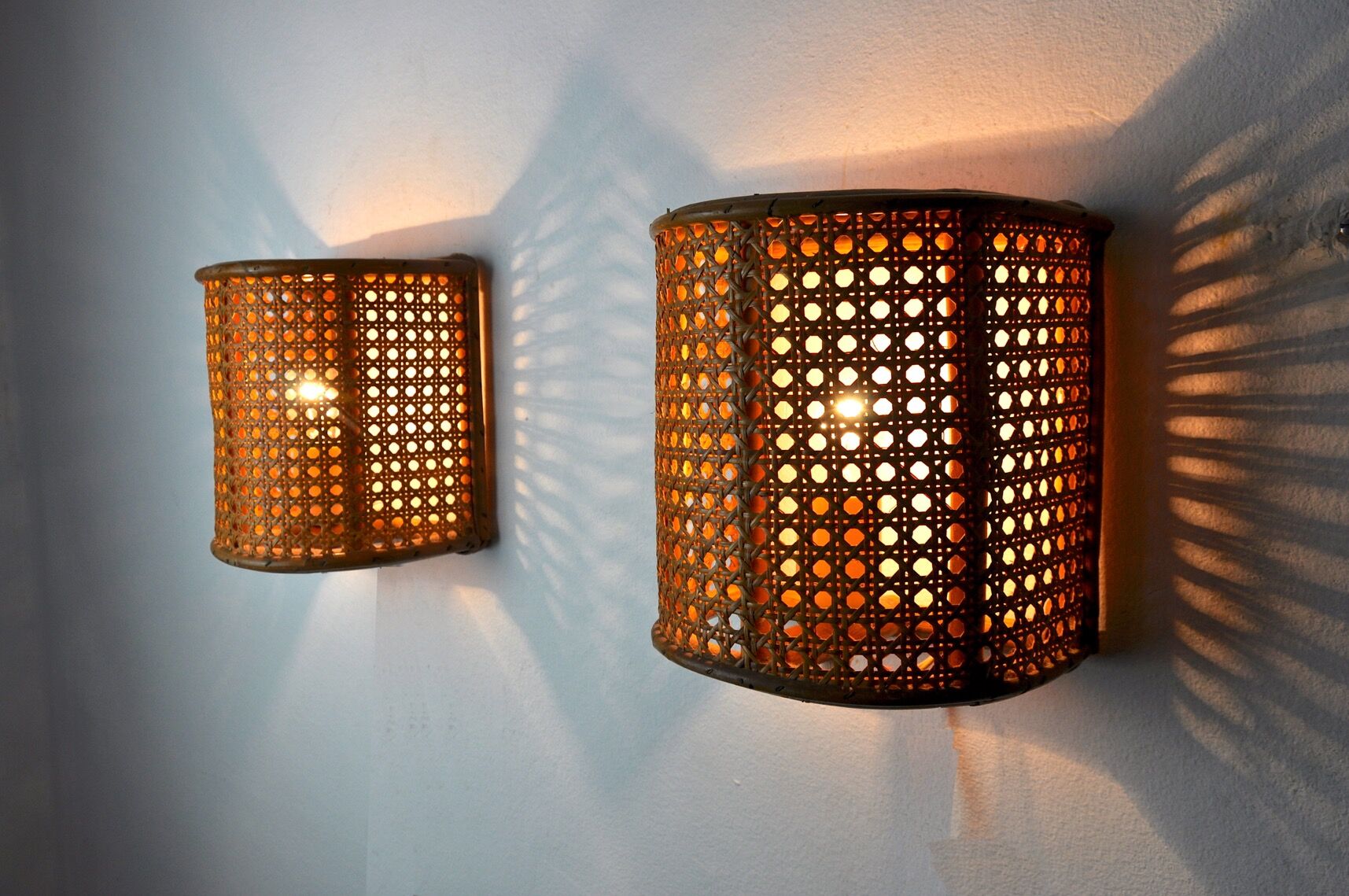 Pair of rattan wall lamps, France, 1960