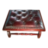 Ottoman in wood and leather