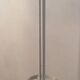 Vintage metal coat rack on foot