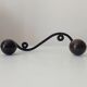 Wood and wrought iron ball coat rack from the 1950s.