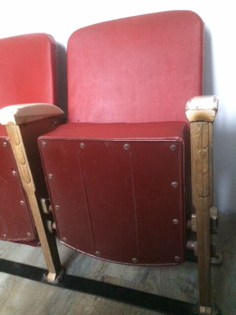 Pair of red skai leather cinema chairs