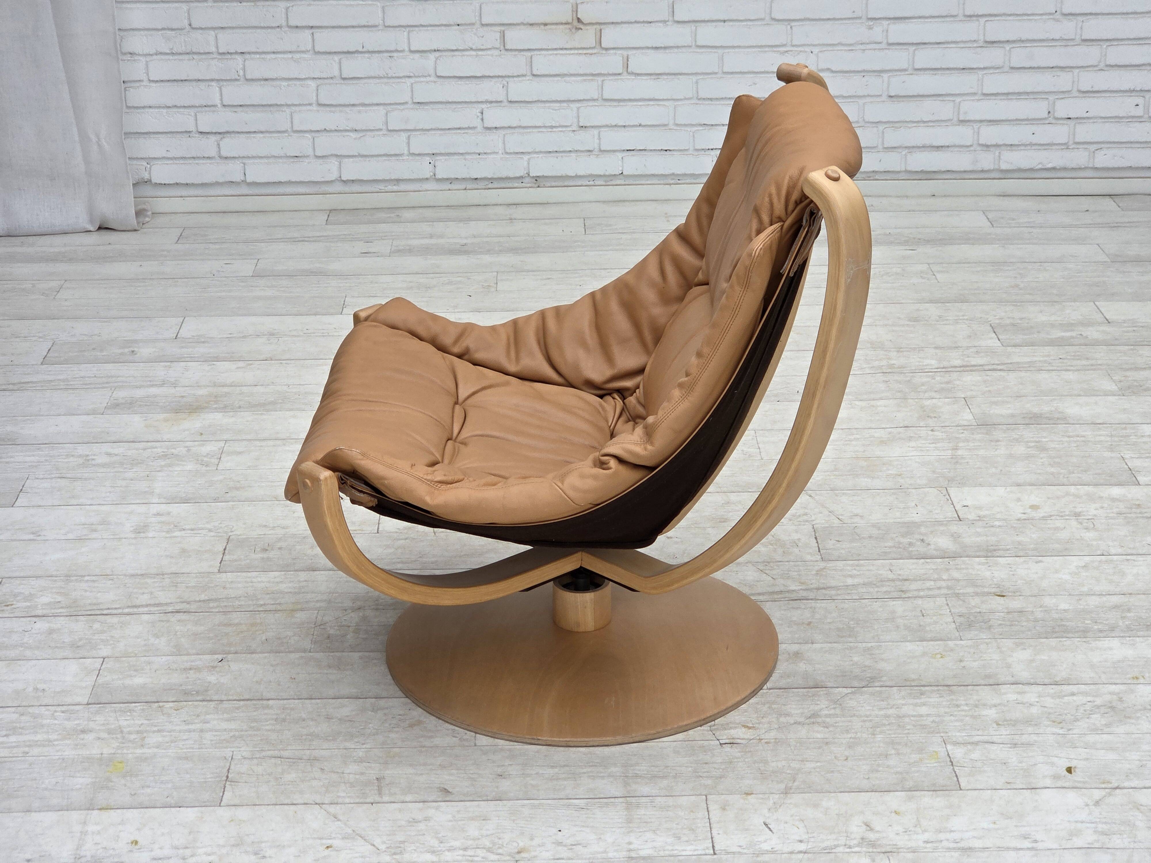 1980s, Scandinavian swivel armchair, furniture leather, bent wood.