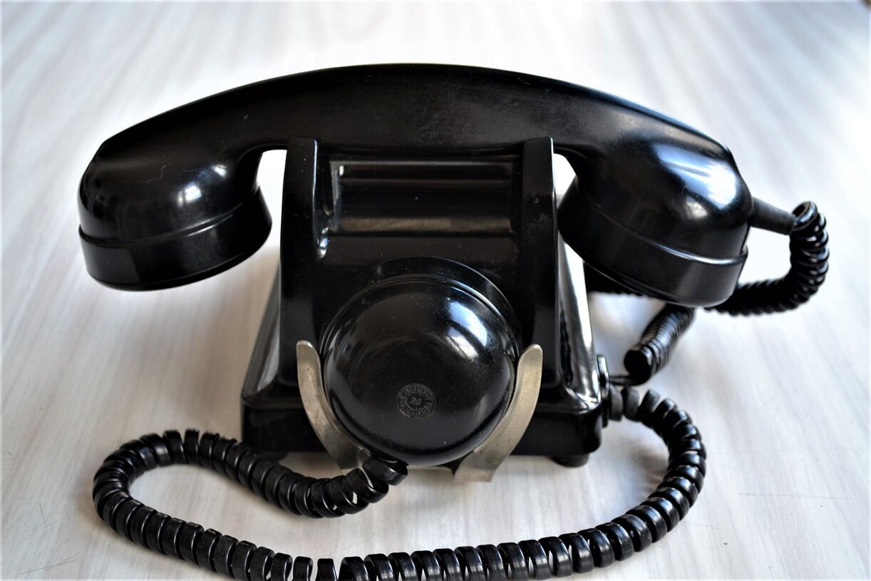 Bakelite dial PTT phone with 1960s vintage earpiece