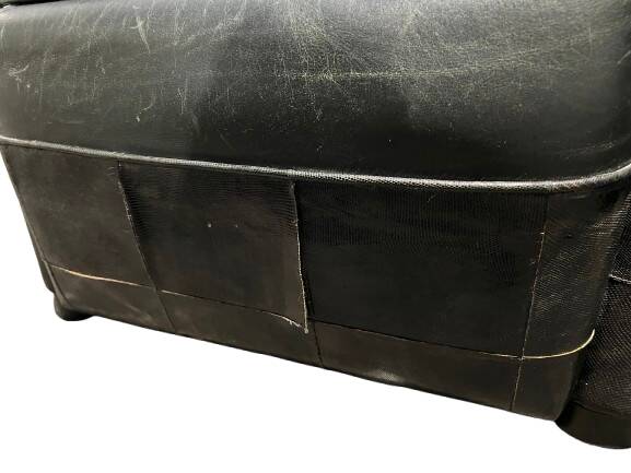 Pair of leather armchairs with marquetry armrests