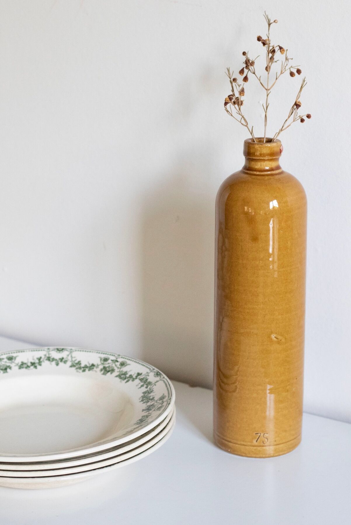 Enamelled stoneware bottle
