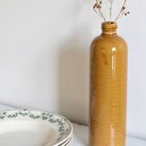 Enamelled stoneware bottle