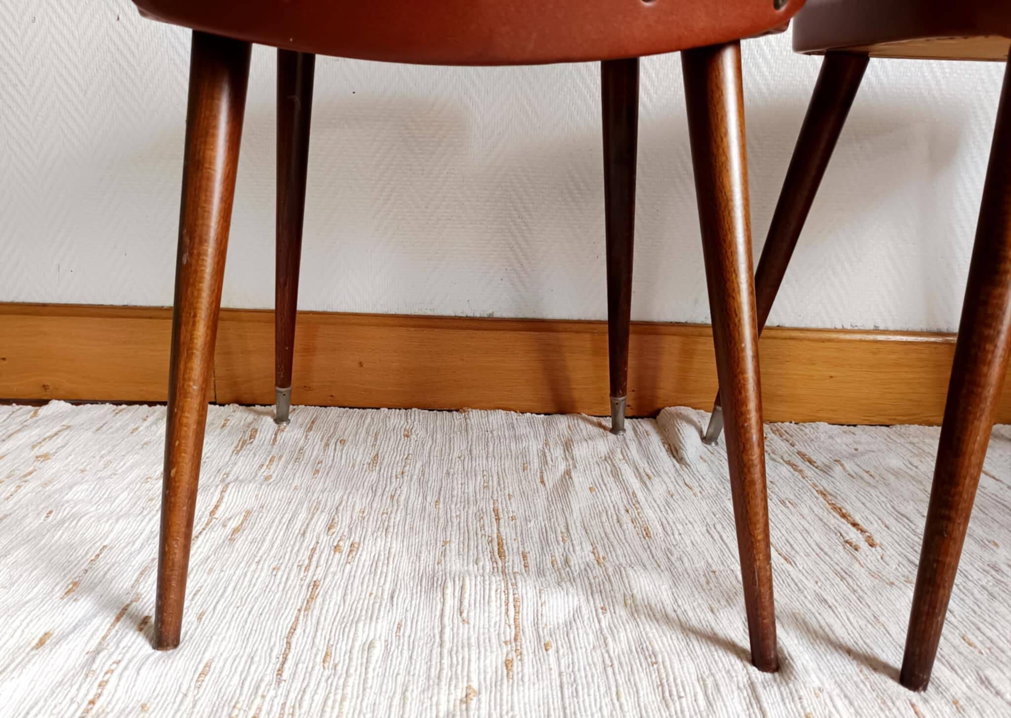 Pair of vintage vinyl chairs with splayed legs