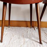 Pair of vintage vinyl chairs with splayed legs