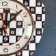 Vintage silent asymmetrical wall pendulum clock "Black and white checkered flowers"