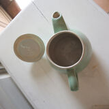 Former art deco teapot in green faïence