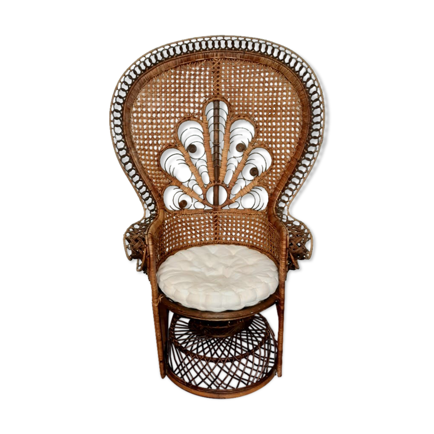 Peacock rattan armchair, circa 1960