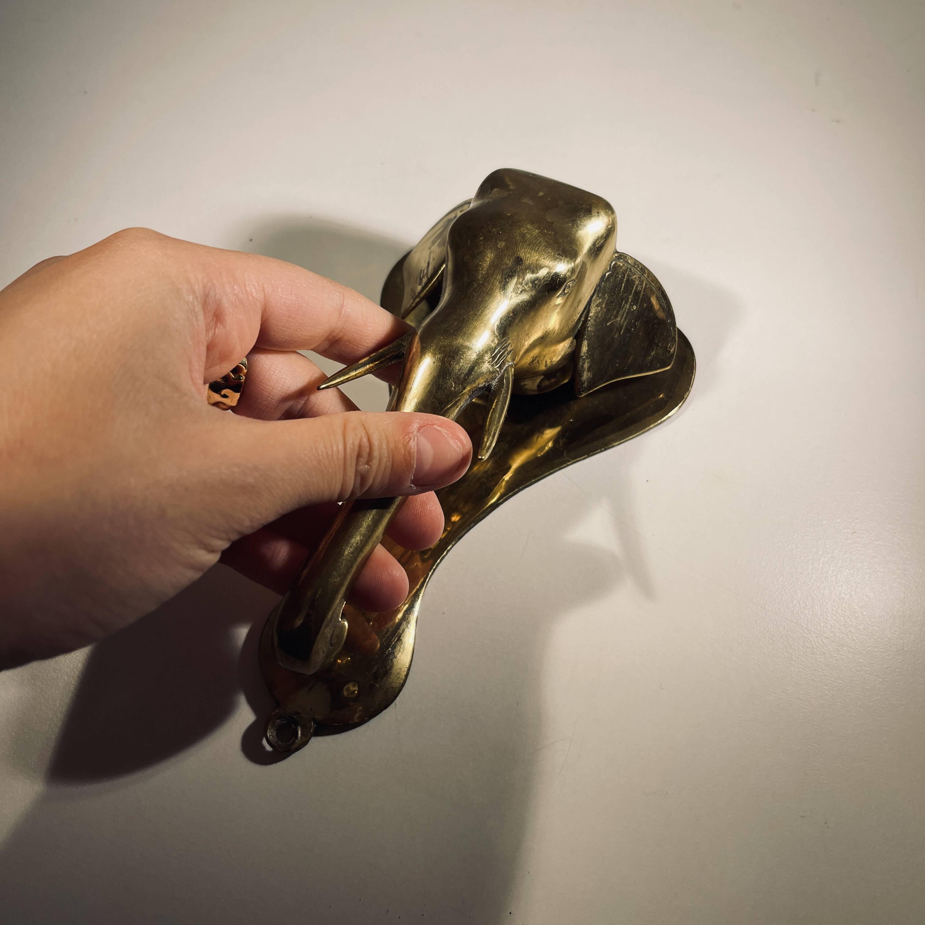 Door knocker / wall paperweight, bronze elephant sculpture