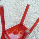 Orange design chair in polycarbonate plexiglass