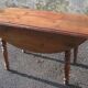 Oval flap table